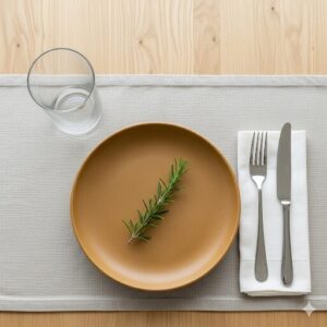 透明感のあるグラスと温かみのある陶器のプレートが完璧に調和しているテーブルセッティング。